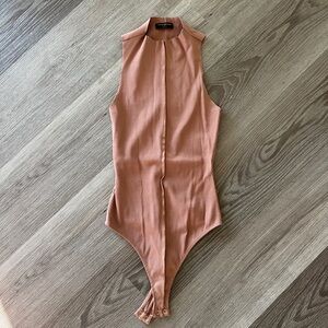 Naked Wardrobe Bodysuit. Size Medium